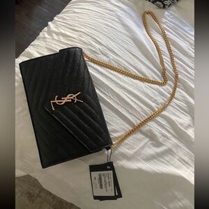 YSL Monogram Large Wallet on Chain in Grained Leather